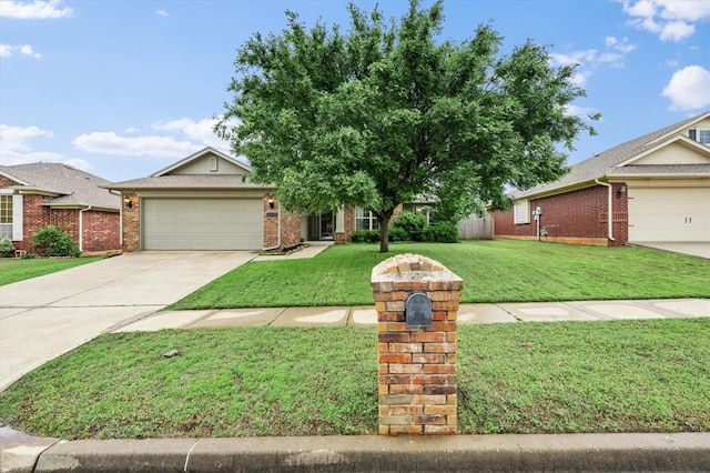 obstructed view of property featuring an attached garage, concrete driveway, brick siding, and a front yard