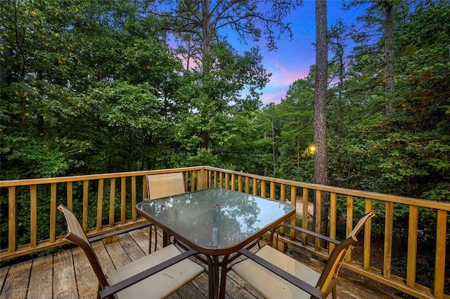 deck featuring outdoor dining area