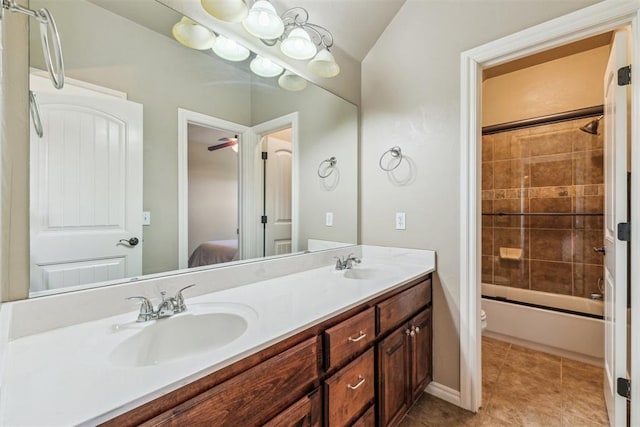 bathroom featuring tile patterned floors, double vanity, a sink, and tub / shower combination
