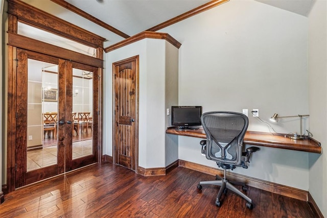 home office featuring built in desk, french doors, wood finished floors, crown molding, and baseboards