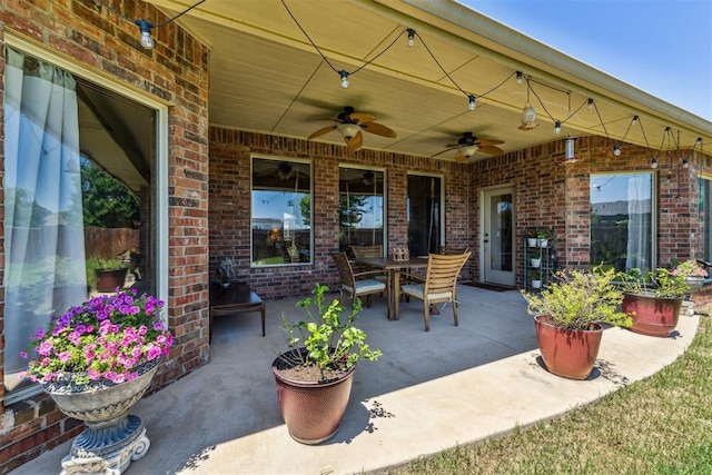 view of patio / terrace with ceiling fan and outdoor dining area