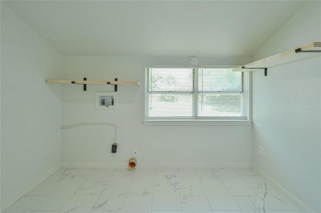 laundry room with laundry area, marble finish floor, washer hookup, and baseboards