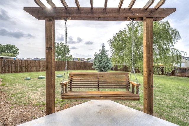 view of home's community featuring a lawn, a patio, and a fenced backyard