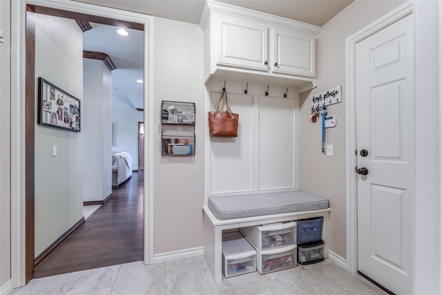 mudroom featuring baseboards