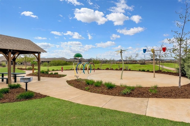 view of home's community with a gazebo, a yard, and playground community