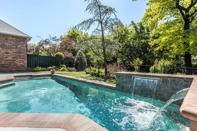 view of swimming pool with a fenced in pool and a fenced backyard