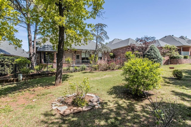 view of yard featuring fence