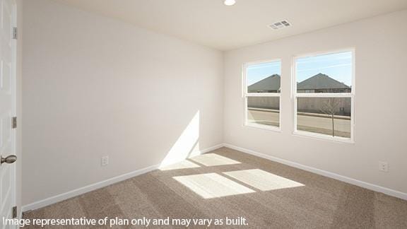 empty room featuring carpet floors, recessed lighting, baseboards, and visible vents