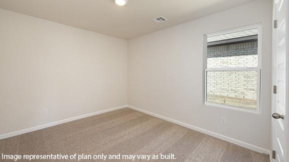 carpeted empty room with baseboards and visible vents