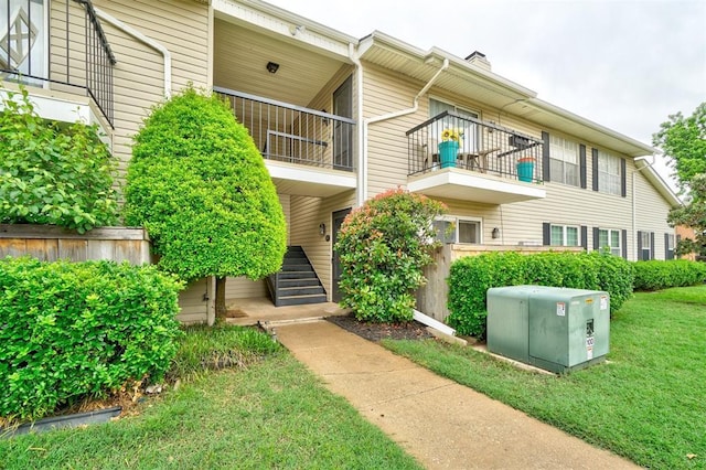 view of property with stairway