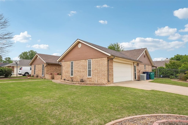 view of front facade featuring brick siding, central AC, a front lawn, concrete driveway, and an attached garage