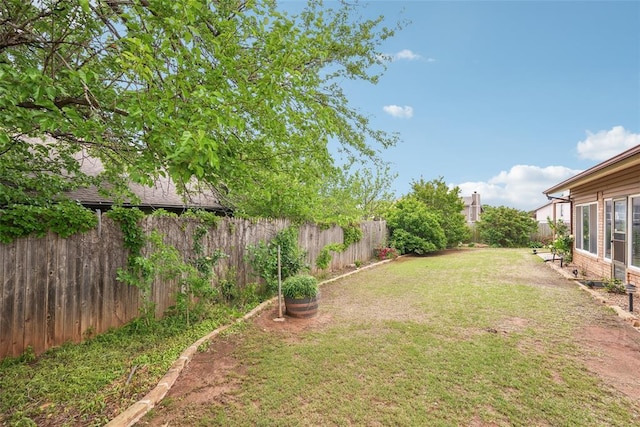 view of yard featuring a fenced backyard
