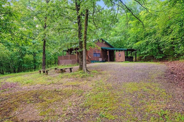 206 Orca Rd, Broken Bow, OK 74728 - view of yard featuring a wooded view