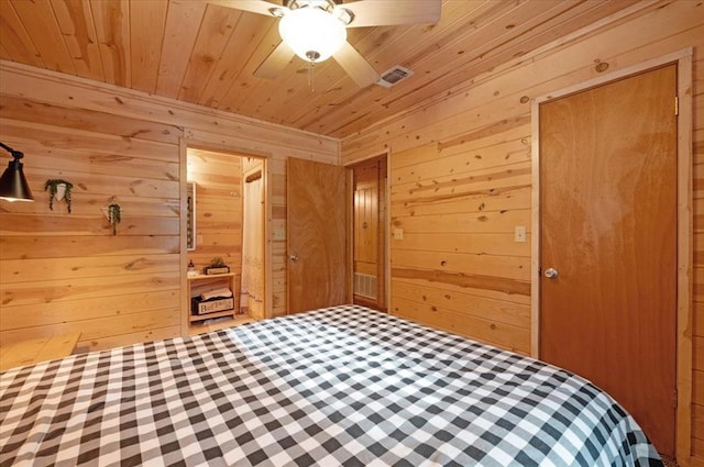 206 Orca Rd, Broken Bow, OK 74728 - bedroom with wooden walls, wood ceiling, and a ceiling fan