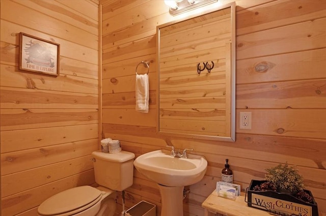 206 Orca Rd, Broken Bow, OK 74728 - half bathroom with wood walls and toilet