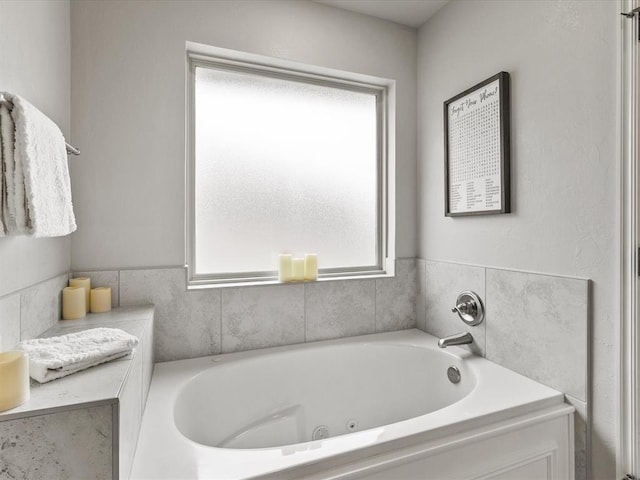 bathroom featuring a whirlpool tub