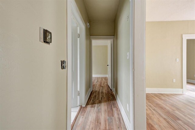 1629 Birch St, Oklahoma City, OK 73108 - hall with light wood finished floors and baseboards