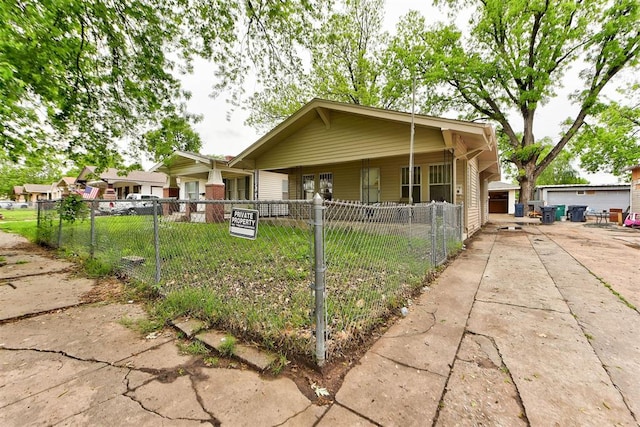 1629 Birch St, Oklahoma City, OK 73108 - view of front of property with a fenced front yard