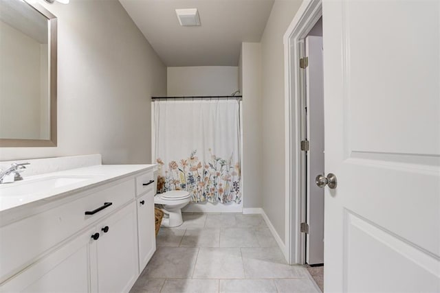 full bathroom with vanity, toilet, tile patterned floors, a shower with shower curtain, and baseboards