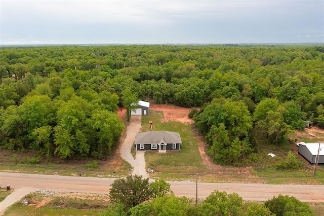 bird's eye view featuring a view of trees