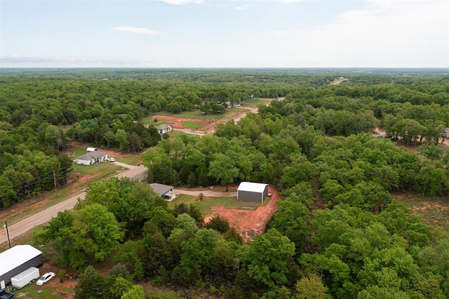 bird's eye view featuring a view of trees