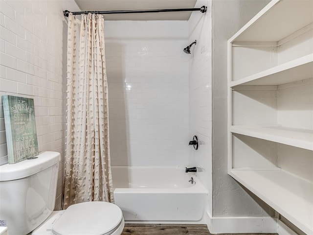 bathroom with wood finished floors, shower / bath combination with curtain, and toilet