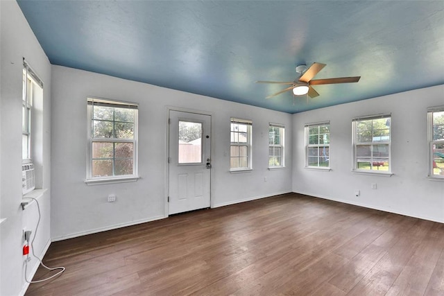 208 Harrogate Dr, Yukon, OK 73099 - entryway with ceiling fan, wood finished floors, and baseboards