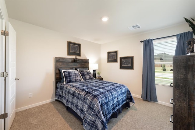 carpeted bedroom with visible vents, recessed lighting, and baseboards
