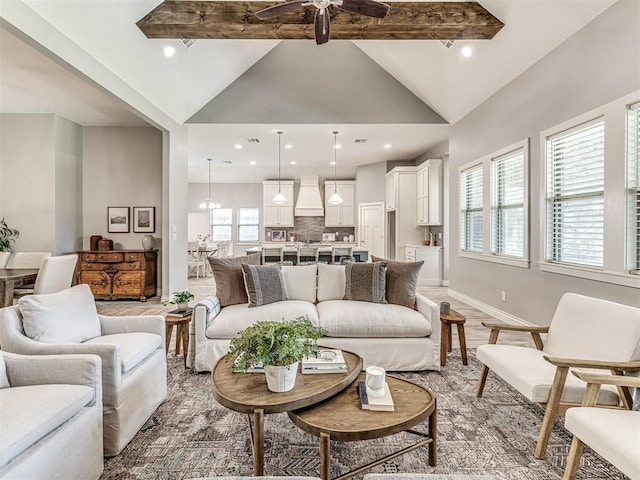 living room with baseboards, ceiling fan, lofted ceiling with beams, and recessed lighting