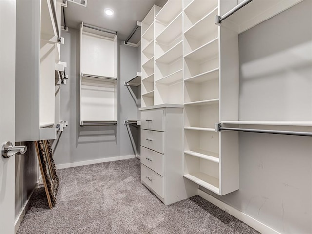 walk in closet with carpet and visible vents