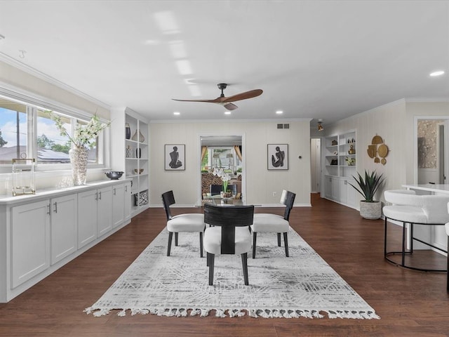 dining space with crown molding, built in features, dark wood-style floors, recessed lighting, and a ceiling fan