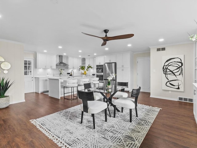 dining area featuring visible vents, ornamental molding, a ceiling fan, and recessed lighting