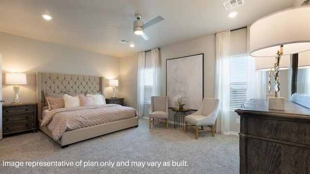 carpeted bedroom featuring recessed lighting, ceiling fan, and visible vents