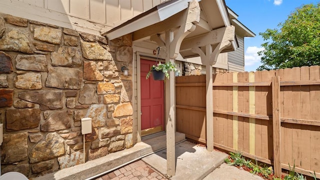 view of patio featuring fence