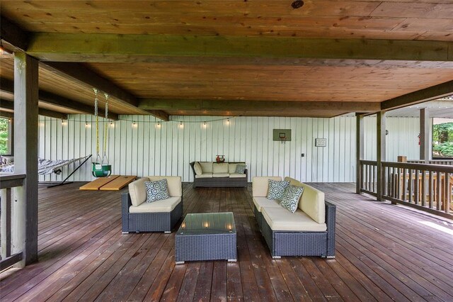 wooden terrace with outdoor lounge area