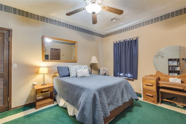 bedroom featuring carpet floors, baseboards, and visible vents