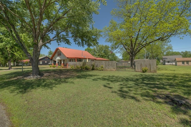 view of yard with fence