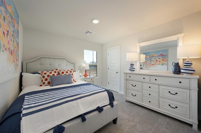 carpeted bedroom with recessed lighting and visible vents