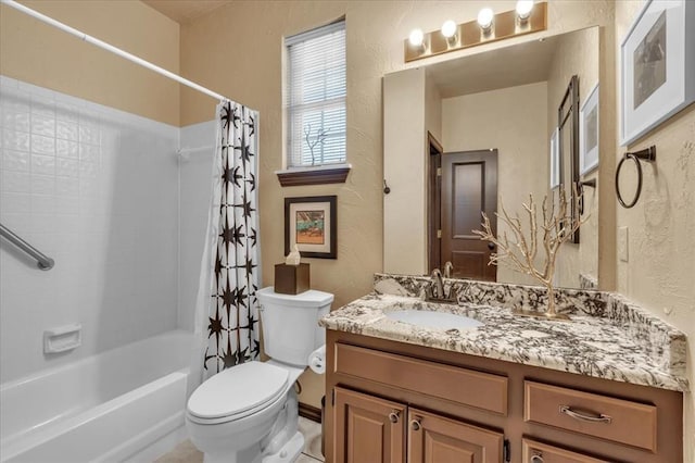 1008 Bavarian Dr, Edmond, OK 73034 - bathroom featuring a textured wall, vanity, and shower / bath combo with shower curtain
