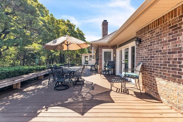 1008 Bavarian Dr, Edmond, OK 73034 - wooden deck with outdoor dining space