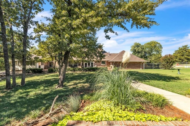 1008 Bavarian Dr, Edmond, OK 73034 - view of front facade with brick siding