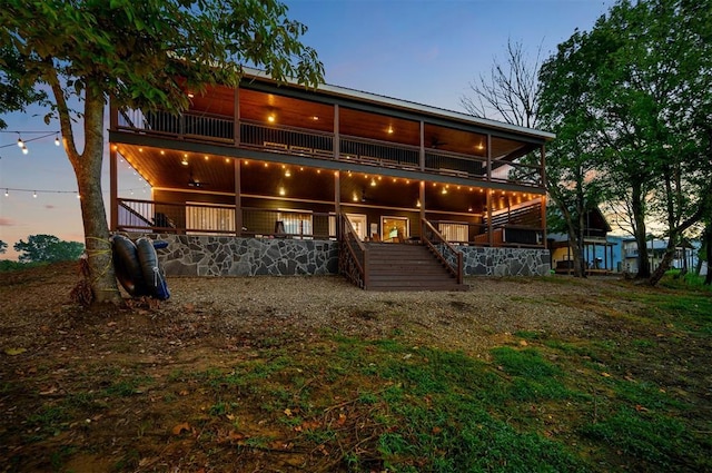 370 Stones River Ln, Broken Bow, OK 74728 - rear view of house with stairway