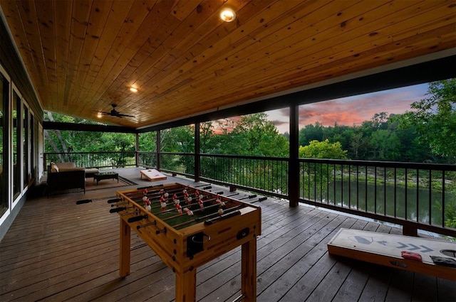 370 Stones River Ln, Broken Bow, OK 74728 - deck with outdoor lounge area and ceiling fan