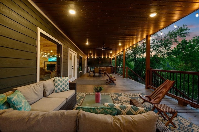 370 Stones River Ln, Broken Bow, OK 74728 - deck at dusk featuring an outdoor living space, french doors, and ceiling fan