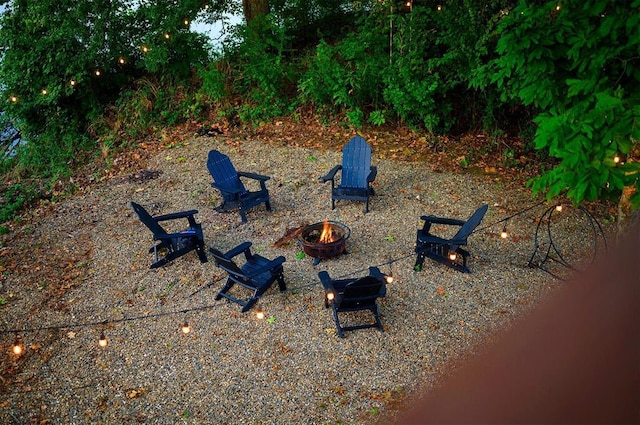 370 Stones River Ln, Broken Bow, OK 74728 - view of yard with an outdoor fire pit