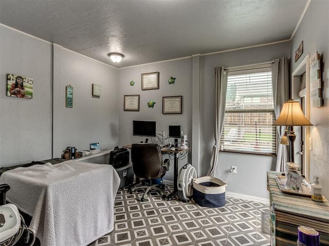 home office with baseboards and tile patterned floors