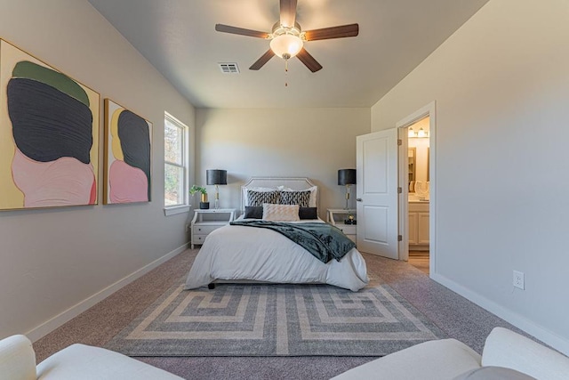 bedroom featuring carpet flooring, connected bathroom, ceiling fan, baseboards, and visible vents