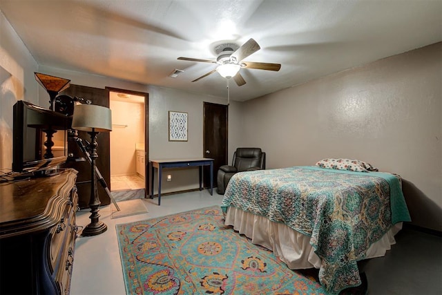 bedroom with visible vents, ceiling fan, and ensuite bathroom