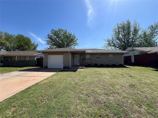 924 N Bradley Ave, Oklahoma City, OK 73127 - single story home featuring brick siding, a garage, a front yard, and concrete driveway