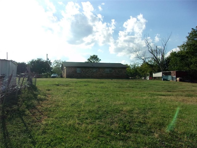 view of yard with fence